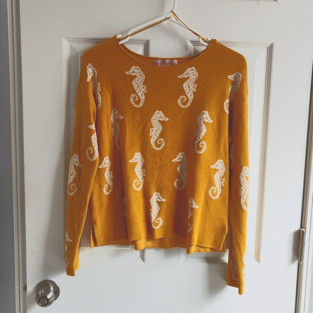 Mid waist sweater, sleeves hit at wrist, is a petite small from Philosophy